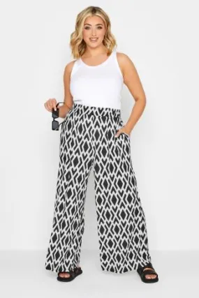 YOURS Curve White Geometric Print Wide Leg Trousers